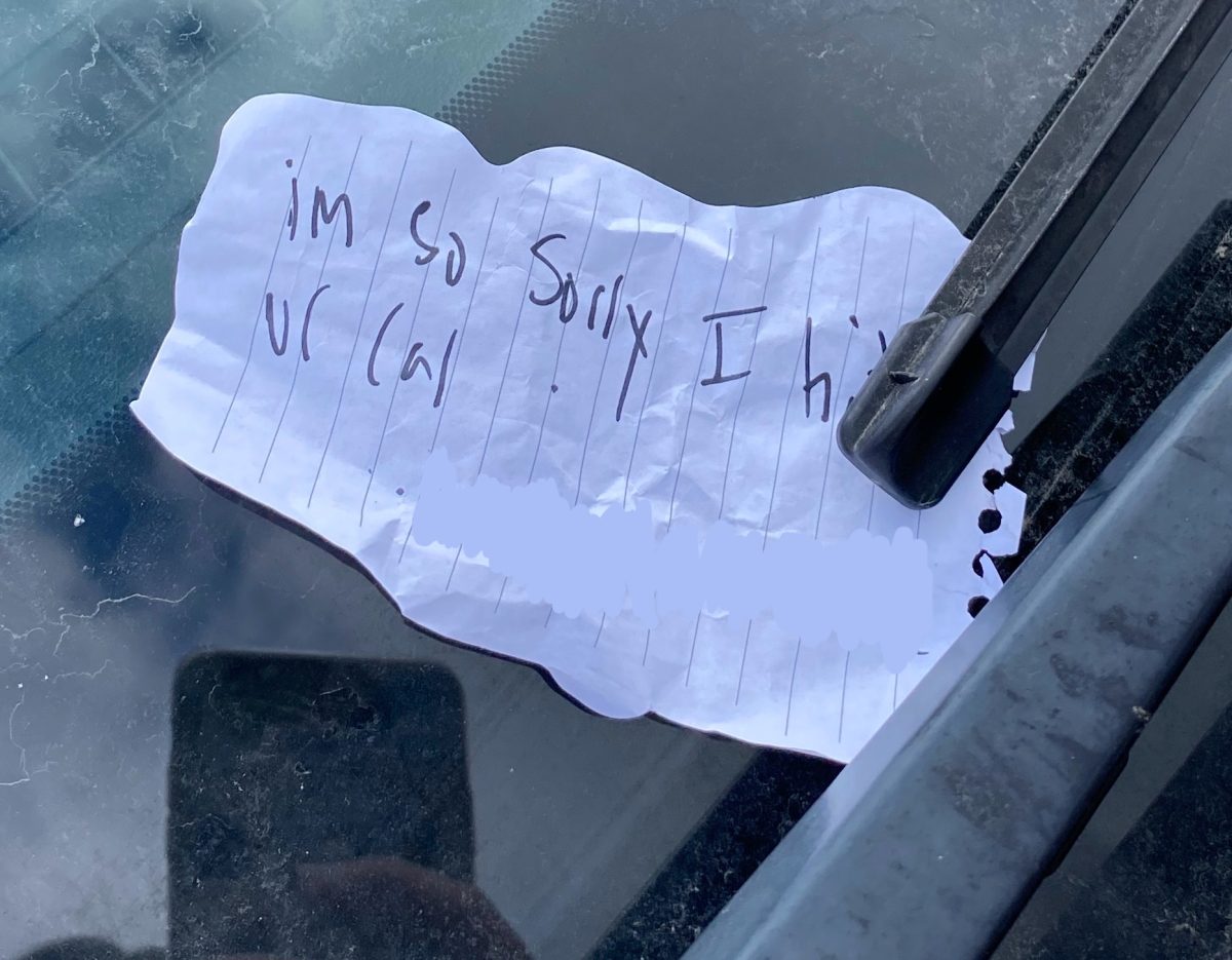 Photo of Note on Windshield.