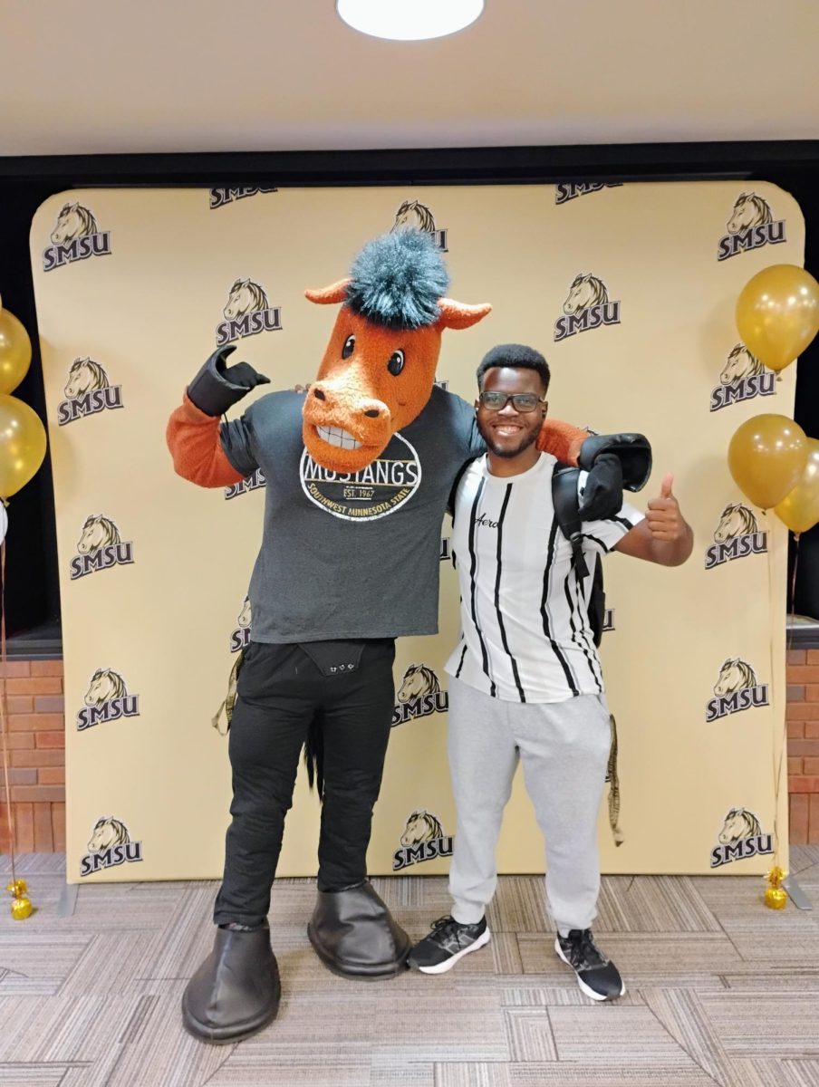 Bryan Kachingwe Posing with Stanger