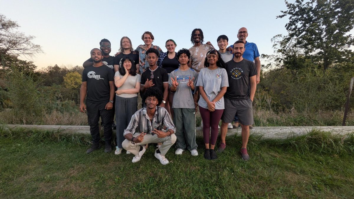 The Members of Bridges International posing for a picture at Shady Oak ATV trails.