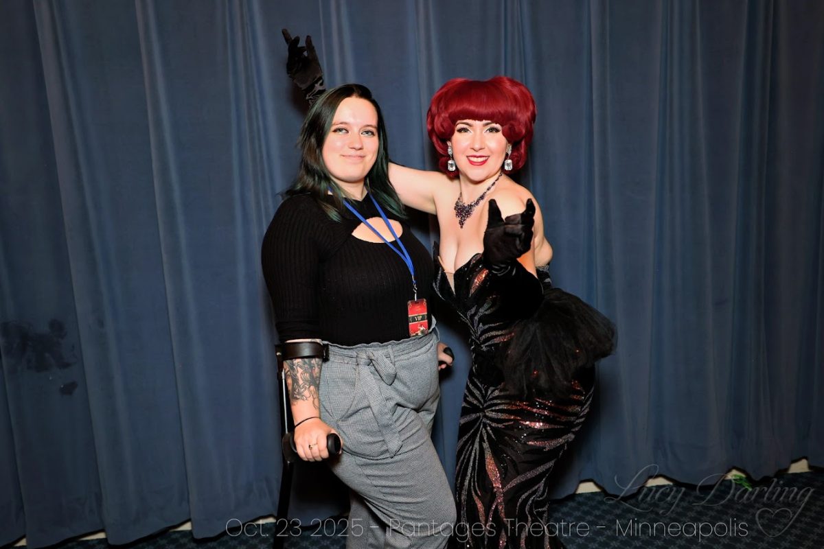 Kela posing with Lucy Darling