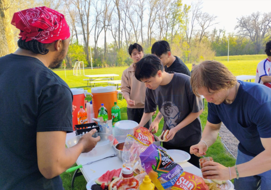 Bridges International Members Preparing Their Food.